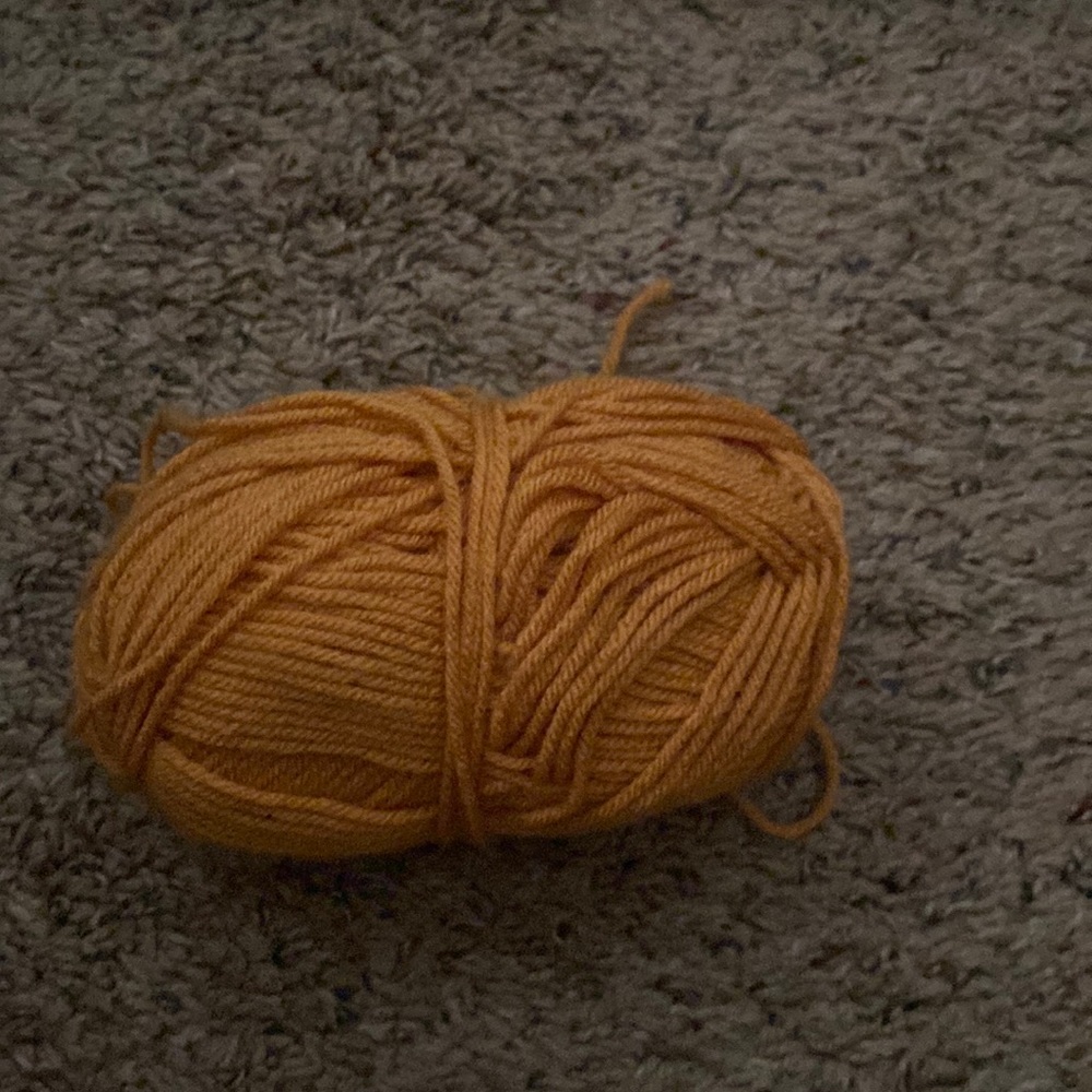 Yellowish orange yarn